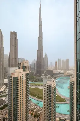a view of a city with tall buildings at Bellavista - 29 BLVD - 1 Bedroom Burj Khalifa & Fountain View in Dubai