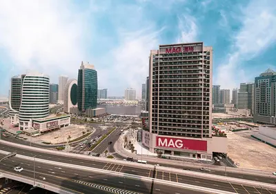 a view of a city with a highway and buildings at lux 2BD in heart of Downtown, 2 Mins Walk to Dubai Mall - Burj al Nujoom in Dubai