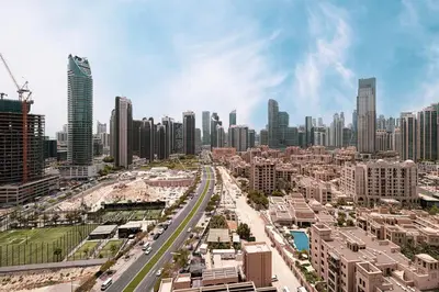 an aerial view of a city with tall buildings at 5 Minute Walk to The Fountains! Full Burj Khalifa View! 5-star Pool & Gym! in Dubai