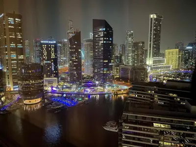a view of a city skyline at night at Vacay Lettings - Bay Central Tower - Studio in Dubai