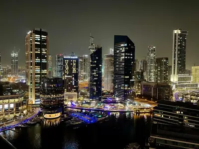 a view of a city at night with at Vacay Lettings - Bay Central Tower - Studio in Dubai