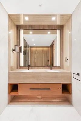 a bathroom with a sink and a large mirror at Vonder Bluewaters Residences SA2 in Dubai
