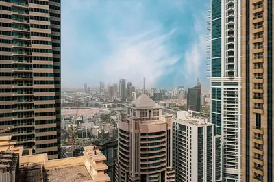 a view of a city with tall buildings at Lux 2BR with Sea Views in Marina in Dubai