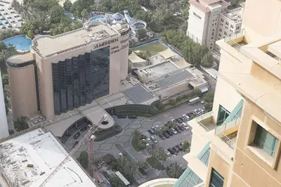 an overhead view of a large building in a city at Lux 2BR with Sea Views in Marina in Dubai