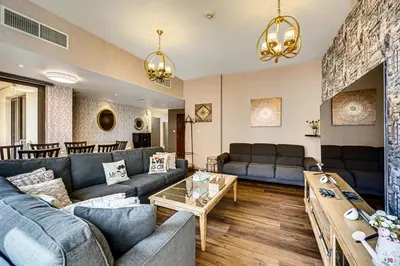 a living room with couches and a table at Jumeirah Beach Residence - Bahar 1, Dubai Marina in Dubai