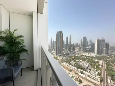 a balcony with a view of the city at Sky High Luxury 50th FLR Lux 2BDR Apartment in Downtown in Dubai