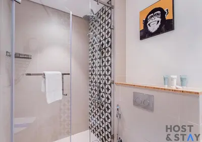 a shower with a glass door in a bathroom at Amazing 2BR in Collective 2 in Dubai