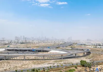 an overhead view of a highway in a city at Serene 1BR Getaway In Collective in Dubai
