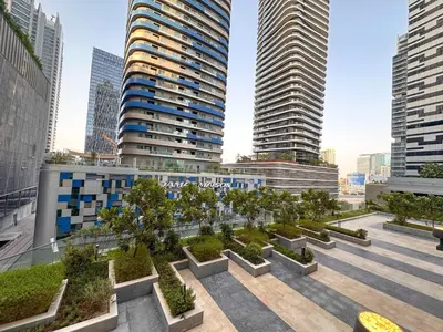 a view of a city with tall buildings at AWS Holiday Homes - In the Heart of Downtown in Dubai
