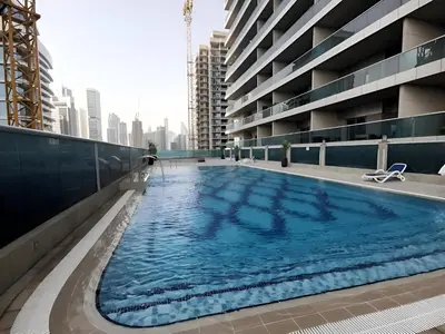 a swimming pool on the roof of a building at Elite Residence - Business Bay in Dubai