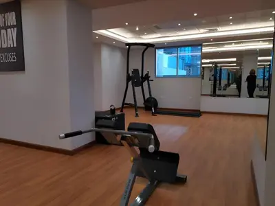 a gym with exercise equipment in a building at Elite Residence - Business Bay in Dubai