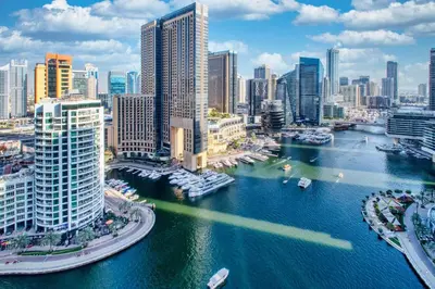an aerial view of a city with a river and buildings at ShoresInn - Spacious unit with Dubai Marina View in Dubai