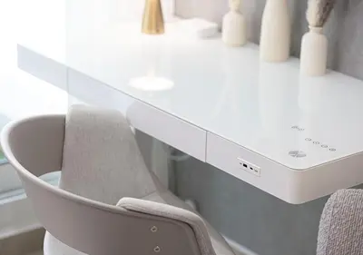 a white desk with two chairs in a room at Luxury home with stunning view in Dubai