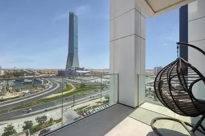 a balcony with a view of a highway at Medore Brand New Flat in Dubai - 8 in Dubai