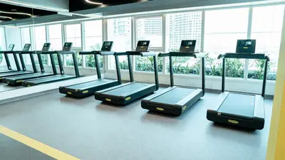 a row of luggage racks in an airport terminal at Medore High Floor Brand New Apartment - 27 in Dubai