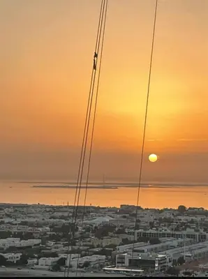a view of a city with the sunset in the background at Aykon City 2 bedroom Burj view in Dubai