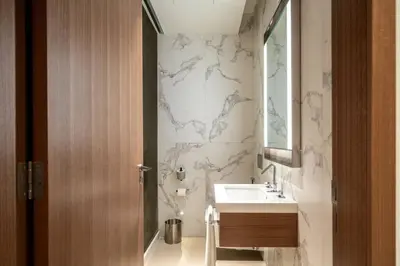 a bathroom with a sink and a mirror at Address Emaar Flagship Burj Khalifa Fountain view UPSCALE in Dubai