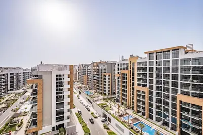 an aerial view of a city with tall buildings at Spacious Studio with Community and Partial Burj Khalifa Views by Deluxe Holiday Homes in Dubai