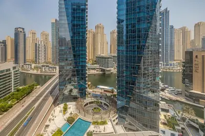 an aerial view of a city with tall buildings at Sleek and Modern 2BR in West Avenue, Dubai Marina- Allsopp&Allsopp in Dubai