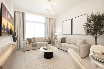 a living room with white furniture and a large window at Burj Crown - Urban Chic Opera Boulevard View, Walk to Dubai Mall in Dubai