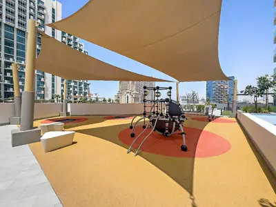 a camera on the roof of a building at Stunning Studio w Pool & Gym in Dubai