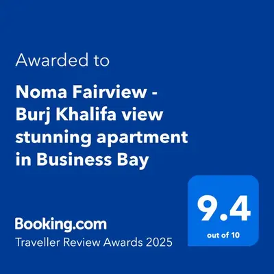 a blue sign with the text awarded to naoma railway but khalifa view at Noma Fairview - Burj Khalifa view stunning apartment in Business Bay in Dubai