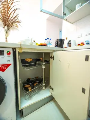 a cupboard in a kitchen with some food at Luxury two bedrooms with Jbr and Marina view apartment in Dubai