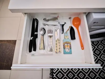 a drawer filled with utensils in a kitchen at Luxury two bedrooms with Jbr and Marina view apartment in Dubai