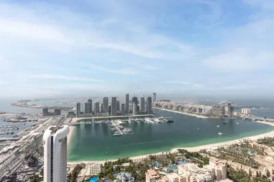 an aerial view of a city with a harbor at The Luxe Marina Experience - Stylish 2BR with Sweeping Balcony Views for Total Relaxation in Dubai