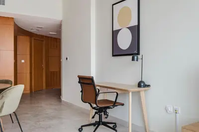 an office with a desk and a chair at Blueground DIFC swimming pool gym security DXB-1545 in Dubai