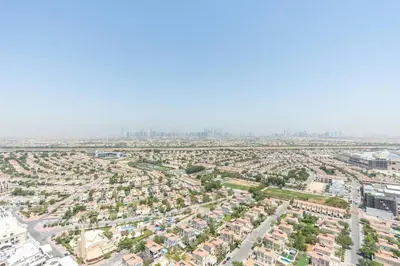 an aerial view of a city with houses at Nice studio in JVT - Al Manara Tower - Dubai in Dubai
