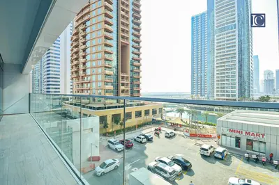 a view of a parking lot in a city with buildings at Luxury Escapes - ME DO RE Tower JLT in Dubai