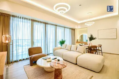 a living room with a couch and a table at Luxury Escapes - ME DO RE Tower JLT in Dubai