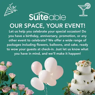 a white wedding cake with pink flowers on a blue background at Exceptional 1Bedroom with Premium Amenities in Dubai