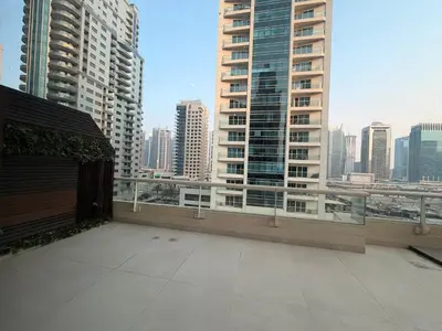 a balcony with a view of a city skyline at Upgraded 2 bedroom at Dubai Marina in Dubai
