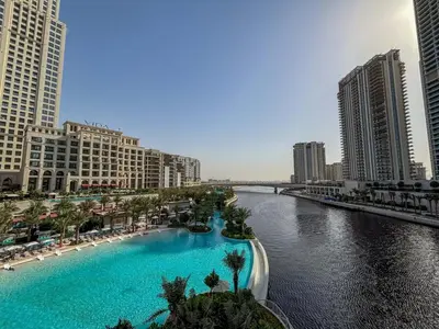 a view of a river in a city with tall buildings at Frank Porter - Vida Creek Beach in Dubai