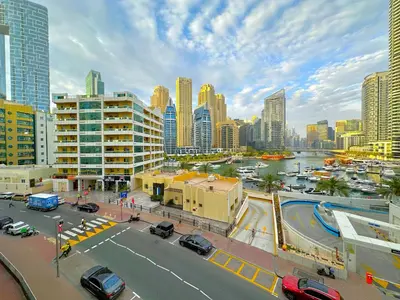 a view of a city with a river and buildings at Luxury Studio w Marina View & New Furnishings for 4 Pax in Dubai