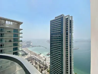 a view of a tall building with the ocean at Silkhaus 1BDR Sea View Retreat with Private Beach in Dubai