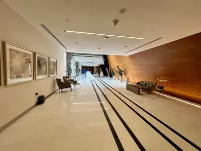 a bowling alley with bowling lanes in a building at Sparkle Tower Panoramic Marina View 1BR in Dubai