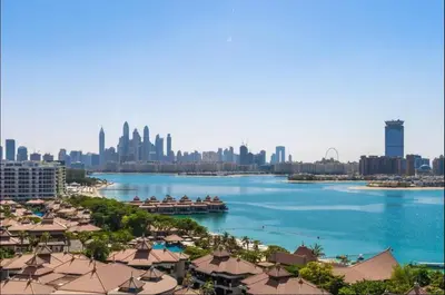 a view of a city with a river and buildings at AWS Holiday Homes - Oasis in the Palm in Dubai