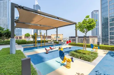 a playground on the roof of a building at 2BR Burj Khalifa & Fountain Views Burj Crown 39th Floor in Dubai
