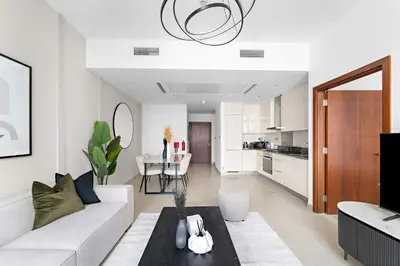 a living room with a couch and a table at Silkhaus Modern Dubai Marina 1BDR Marina Gate in Dubai