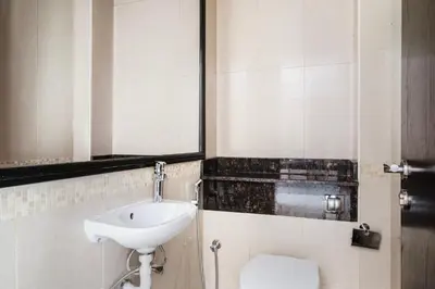 a bathroom with a sink and a toilet at Blueground JLT lake view roof pool gym DXB-1546 in Dubai