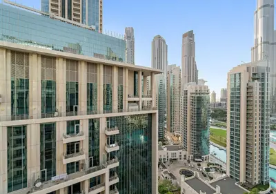 a view of a city skyline with tall buildings at Burj Khalifa View Downtown Gem, 8 Minutes Walk to Dubai Mall in Dubai