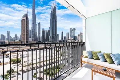 a balcony with a view of a city skyline at Premium Downtown Home with Burj Khalifa View in Dubai