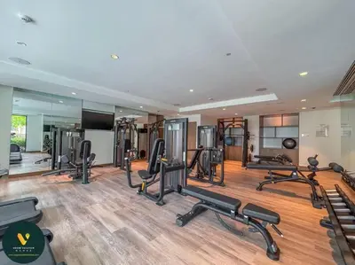 a gym with several treadmills and exercise machines at Prime location - ACT 1 ACT 2 - Downtown in Dubai