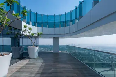 a balcony of a building with a view of the city at Dubai Luxe Haven - World Record Residence in Dubai