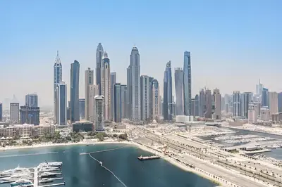 a view of a large city with a harbor at 2BR Beachfront Apt with Stunning Dubai Marina View in Dubai