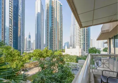 a view of a city skyline with tall buildings at Stylish 2BR I Partial Burj View I Downtown Dubai in Dubai
