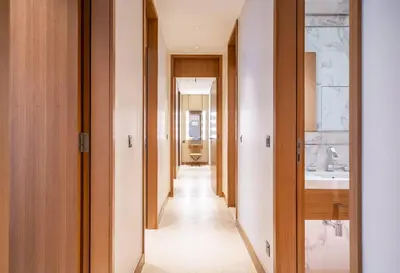 a hallway leading to a bathroom in a house at NewArabian Opera Address Residences in Dubai